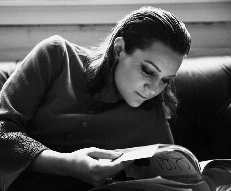 Nicolle Hodges reading a book